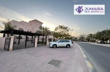 Outdoor Building image for: Villa - 5 Bedrooms - 7 Bathrooms for sale in Al Hamra Village - Ras Al Khaimah, Image 1