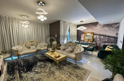 Living Room image for: Townhouse - 4 Bedrooms - 5 Bathrooms for sale in Janusia - The Roots DAMAC Hills 2 - Damac Hills 2 - Dubai, Image 1