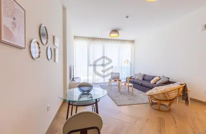 Living Room image for: Apartment - 1 Bedroom - 2 Bathrooms for rent in 1 Residences - Wasl1 - Al Kifaf - Dubai, Image 1