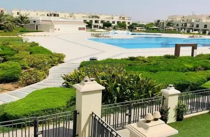 Pool image for: Townhouse - 4 Bedrooms - 5 Bathrooms for sale in Bayti Townhouses - Al Hamra Village - Ras Al Khaimah, Image 1