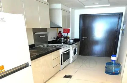 Kitchen image for: Apartment - 1 Bathroom for rent in Carson - DAMAC Hills - Dubai, Image 1