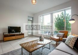 Living Room image for: Apartment - 1 bedroom - 1 bathroom for rent in Burj Views podium - Burj Views - Downtown Dubai - Dubai, Image 1
