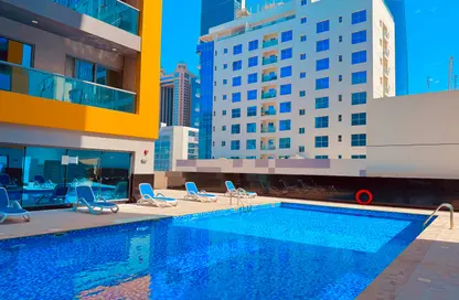 Apartment - 1 Bedroom - 2 Bathrooms for rent in Jumeirah Garden City - Al Satwa - Dubai