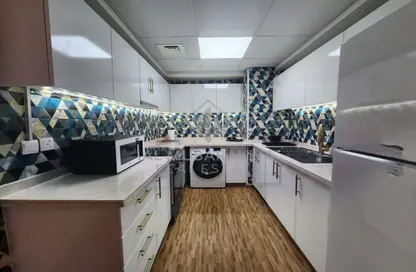 Kitchen image for: Apartment - 1 Bedroom - 1 Bathroom for rent in Pacific Fiji - Pacific - Al Marjan Island - Ras Al Khaimah, Image 1