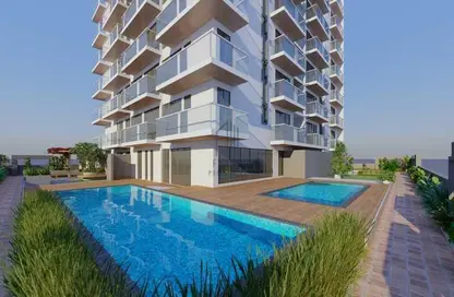 Pool image for: Apartment - 1 Bedroom - 2 Bathrooms for sale in Golden Wood Views 5 - Jumeirah Village Circle - Dubai, Image 1