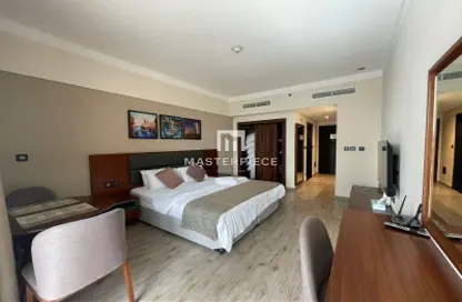 صورة لـ غرفة- غرفة النوم شقة - 1 حمام للايجار في ملانو جيوفاني بوتيك سوتس - قرية الجميرا سركل - دبي ، صورة رقم 1