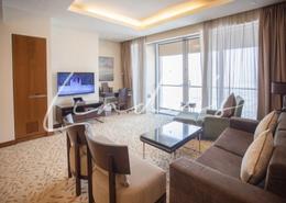 صورةغرفة المعيشة لـ: شقة - 1 غرفة نوم - 2 حمامات للبيع في فندق العنوان دبي مول - دبي وسط المدينة - دبي, صورة 1