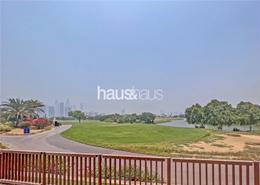 Garden image for: Villa - 3 bedrooms - 2 bathrooms for sale in Montgomerie Maisonettes - Emirates Hills Villas - Emirates Hills - Dubai, Image 1