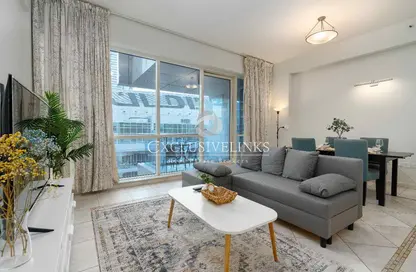 Living / Dining Room image for: Apartment - 2 Bedrooms - 2 Bathrooms for sale in Ary Marina View Tower - Dubai Marina - Dubai, Image 1