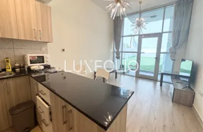 Apartment - 1 Bedroom - 2 Bathrooms for rent in Chaimaa Premiere - Jumeirah Village Circle - Dubai