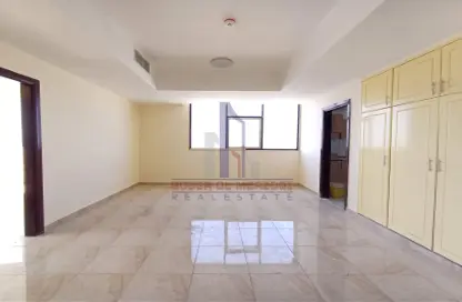 Empty Room image for: Apartment - 2 Bedrooms - 2 Bathrooms for rent in Gulf Pearl Tower - Al Nahda - Sharjah, Image 1