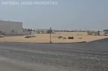 أرض - استوديو للبيع في روضة القرط - ضاحية الروضات - الشارقة