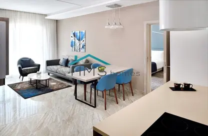 صورة لـ غرفة المعيشة / غرفة الطعام شقة - غرفة نوم - 2 حمامات للايجار في شقق موفنبيك الفندقية داون تاون - دبي وسط المدينة - دبي ، صورة رقم 1