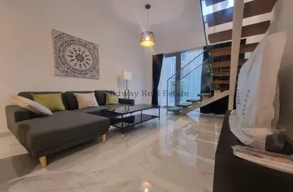 Living Room image for: Apartment - 1 Bedroom - 2 Bathrooms for rent in Al Raha Lofts - Al Raha Beach - Abu Dhabi, Image 1
