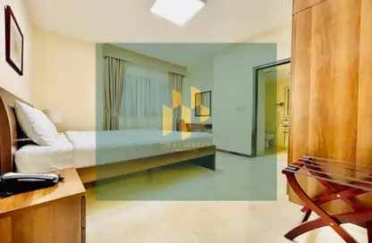 Apartment - 2 Bedrooms - 2 Bathrooms for rent in Al Kali Building - Tourist Club Area - Abu Dhabi