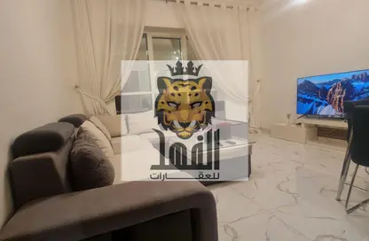 شقة - غرفة نوم - 2 حمامات للايجار في أورينت تاور 1 - أورينت تاور - البستان - عجمان