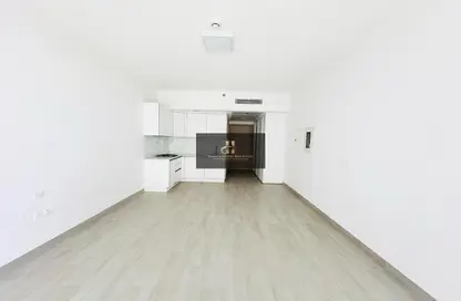 Empty Room image for: Apartment - 1 Bathroom for rent in Luma21 - Jumeirah Village Circle - Dubai, Image 1