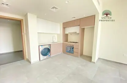 Kitchen image for: Apartment - 1 Bedroom - 2 Bathrooms for rent in Aljada - Sharjah, Image 1