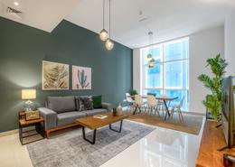 Living / Dining Room image for: Apartment - 1 bedroom - 2 bathrooms for rent in Duja Tower - Sheikh Zayed Road - Dubai, Image 1