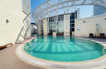 صورة لـ حوض سباحة شقة - غرفة نوم - 2 حمامات للايجار في الجيمي أفينو - الخالدية - أبوظبي ، صورة رقم 1