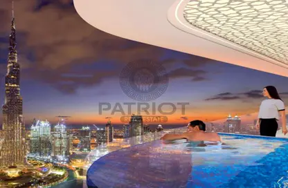 صورة لـ حوض سباحة شقة - 1 حمام للبيع في بيز من دانوب - الخليج التجاري - دبي ، صورة رقم 1