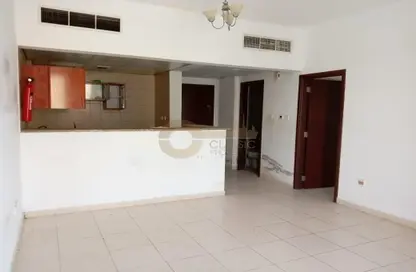 Empty Room image for: Apartment - 1 Bedroom - 2 Bathrooms for rent in IC1-EMR-15 - Emirates Cluster - International City - Dubai, Image 1