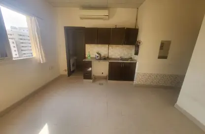 Apartment - Studio - 1 Bathroom for rent in Al Butina 9 Building - Al Butina - Sharjah