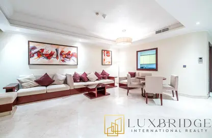 Living / Dining Room image for: Apartment - 1 Bedroom - 2 Bathrooms for rent in Mughal - Grandeur Residences - Palm Jumeirah - Dubai, Image 1