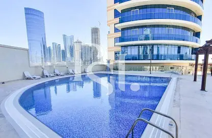 Pool image for: Apartment - 1 Bedroom - 2 Bathrooms for sale in Julfar Residence - City Of Lights - Al Reem Island - Abu Dhabi, Image 1