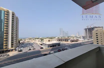 Balcony image for: Apartment - 1 Bedroom - 2 Bathrooms for sale in Ajman One Towers - Al Sawan - Ajman, Image 1