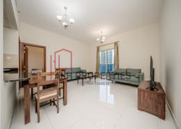 Living / Dining Room image for: Apartment - 1 bedroom - 2 bathrooms for rent in Elite Sports Residence 4 - Elite Sports Residence - Dubai Sports City - Dubai, Image 1