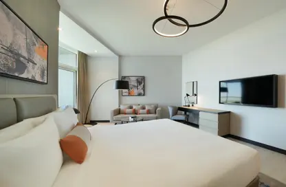 Room / Bedroom image for: Apartment - 1 Bathroom for rent in Damac Hills 2 - Dubai, Image 1