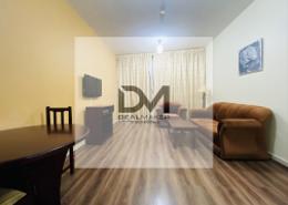Living Room image for: Apartment - 1 bedroom - 2 bathrooms for rent in Al Hazem Tower - Al Nahyan - Abu Dhabi, Image 1