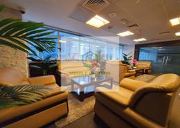 Living Room image for: Apartment - 2 bedrooms - 2 bathrooms for rent in Al Mamoura - Muroor Area - Abu Dhabi, Image 1