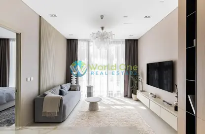 Living Room image for: Apartment - 1 Bedroom - 2 Bathrooms for sale in RA1N Residence - Jumeirah Village Circle - Dubai, Image 1
