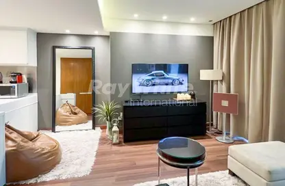 Living Room image for: Apartment - 1 Bathroom for sale in The Address Dubai Mall - Downtown Dubai - Dubai, Image 1