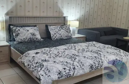 شقة - 1 حمام للايجار في بي03 - طراز فرنسي - المدينة العالمية - دبي