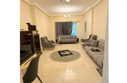 شقة - غرفة نوم - 2 حمامات للبيع في أورينت تاور 1 - أورينت تاور - البستان - عجمان