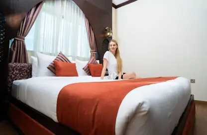 صورة لـ غرفة- غرفة النوم النزل و الشقق الفندقية - غرفة نوم - 1 حمام للايجار في فيرست سنترال للشقق الفندقية - برشا هايتس (تيكوم) - دبي ، صورة رقم 1