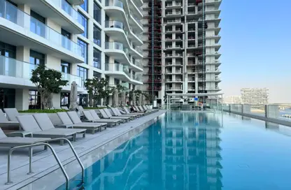 Pool image for: Apartment - 1 Bedroom - 1 Bathroom for rent in Marina Vista - EMAAR Beachfront - Dubai Harbour - Dubai, Image 1