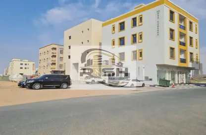 Outdoor Building image for: Land - Studio for sale in Al Alia - Ajman, Image 1