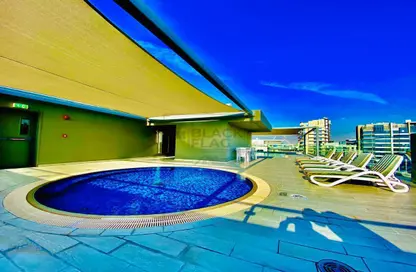 Pool image for: Apartment - 1 Bedroom - 2 Bathrooms for rent in Al Seef - Al Raha Beach - Abu Dhabi, Image 1