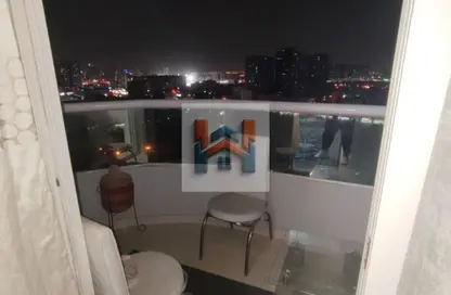 شقة - غرفة نوم - 2 حمامات للايجار في أورينت تاور 1 - أورينت تاور - البستان - عجمان
