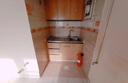 Kitchen image for: Apartment - 1 Bathroom for rent in Muwailih Building - Muwaileh - Sharjah, Image 1