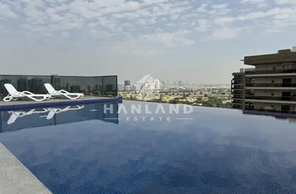 Pool image for: Apartment - 1 Bedroom - 2 Bathrooms for rent in V2 - Dubai Sports City - Dubai, Image 1
