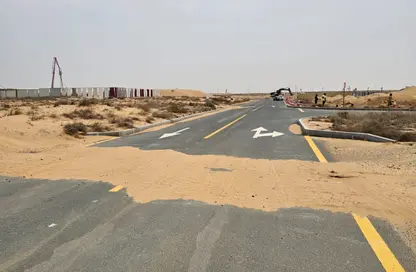 أرض - استوديو للبيع في روضة القرط - ضاحية الروضات - الشارقة