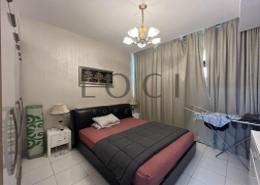 صورةغرفة- غرفة النوم لـ: شقة - 1 غرفة نوم - 1 حمام للبيع في ستارز من دانوب - الفرجان - دبي, صورة 1