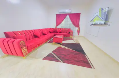 Living Room image for: Apartment - 1 Bedroom - 2 Bathrooms for rent in Al Mowaihat 3 - Al Mowaihat - Ajman, Image 1