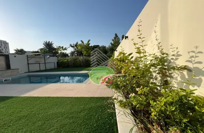 Townhouse - 4 Bedrooms - 6 Bathrooms for sale in Golf Community - Al Zorah - Ajman