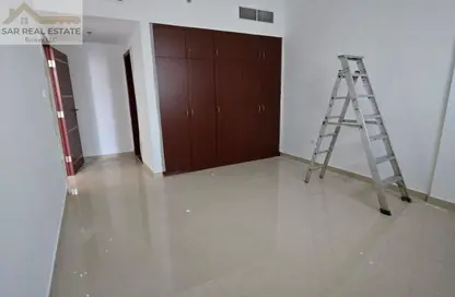 Apartment - 1 Bedroom - 2 Bathrooms for rent in Al Amir Abdullah Building - International City Phase 2 - Al Warsan 4 - Al Warsan - Dubai